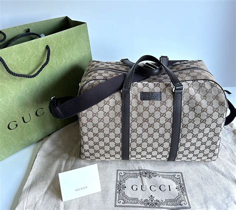 borsone viaggio gucci uomo|Scopri la nuova collezione di borse Gucci uomo su FARFETCH.